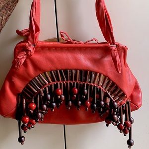 Jamin Puech Orange & Wood beads handbag.